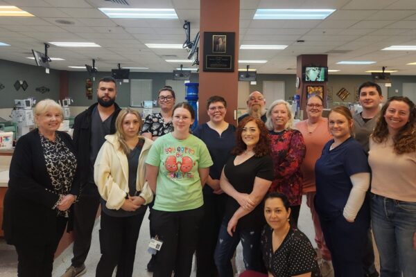 DCI Ukiah staff with plaque acknowledging Hanson’s gift.